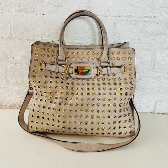 Michael Kors Handbags - Cream and gold Michael Kors purse see photos